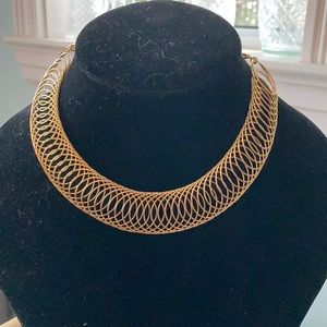 Unique one of a kind “slinky” style vintage gold chocker necklace.